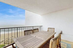 Outdoor dining - Up-to-Date, Oceanfront Condo with Balcony, AC, WiFi, Laundry & Shared Pool (Ocean City)