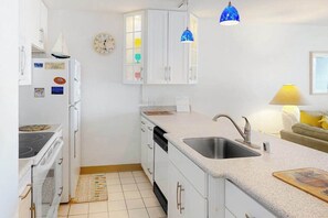 Fridge, microwave, oven, stovetop - Oceanfront Condo with Beach Views, Balcony, AC, WiFi & Shared Outdoor Pool (Ocean City)
