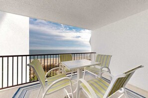 Outdoor dining - Air-Conditioned, Oceanfront Condo with Balcony, WiFi, Laundry & Shared Pool (Ocean City)