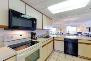 Fridge, microwave, oven, stovetop - Oceanfront Condo with Great View, Balcony, Fast WiFi, AC & Shared Pools/Hot Tub (Ocean City)