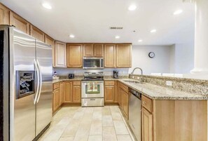 Fridge, microwave, oven, stovetop - Canal-Front Condo 3 Blocks from Beach w/Private Balcony & Shared Outdoor Pool (Ocean City)