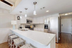 Fridge, microwave, oven, stovetop - Stylish inviting beach condo with balcony, pools, gym & sauna (Ocean City)