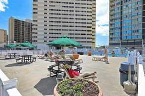 Outdoor dining - Well-equipped condo with balcony, W/D, pools, & tennis (Ocean City)