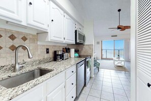 Fridge, microwave, oven, stovetop - Two-Level Bayfront Condo with Amazing Sunsets, Balcony, WiFi & Shared Pool (Ocean City)