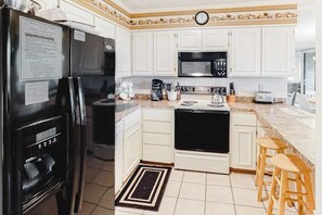 Fridge, microwave, oven, stovetop - Convenient Coastal Condo w/Shared Outdoor Pool, Private Washer/Dryer, Free WiFi (Ocean City)
