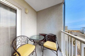 Outdoor dining - Renovated Corner Condo with Ocean View Balcony, Fireplace, & Shared Pool (Ocean City)