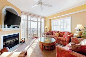 TV, fireplace, DVD player, offices - Well-Decorated, Ocean Block Condo w/ Fireplace, Balcony & Shared Pool/Gym (Ocean City)