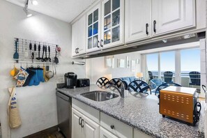 Fridge, microwave, oven, stovetop - Oceanfront condo with two balconies, amazing views, WiFi, AC, & shared pool (Ocean City)