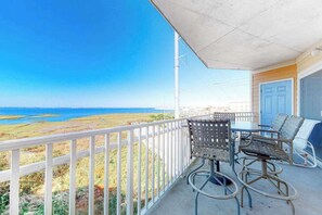 Outdoor dining - Bayside Condo with Balcony, Sunset Views, Central AC, WiFi & Shared Rooftop Pool (Ocean City)