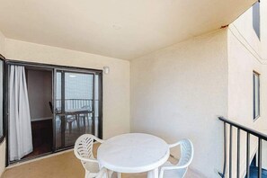 Outdoor dining - Ocean Block Condo with Balcony, Partial Ocean View, Central AC & Washer/Dryer (Ocean City)
