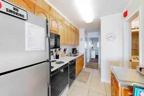 Fridge, microwave, oven, stovetop - Air-Conditioned Condo Steps from the Beach w/ Balcony, WiFi, Washer/Dryer (Ocean City)