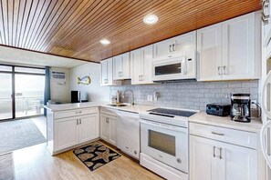 Fridge, microwave, oven, stovetop - Beachfront condo with amazing views, balcony, & outdoor pool (Ocean City)