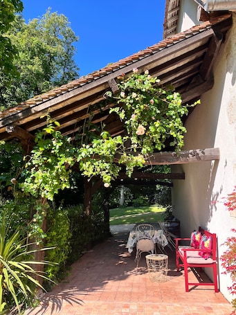 Terrace/patio. Manor in the Countryside: An Exceptional Stay Amidst Nature, History, and Warmth