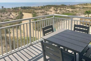 Outdoor dining - Lovely second-floor home with beach views from balcony + free WiFi, elevator (Ocean City)