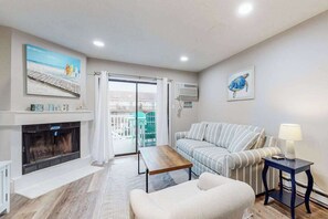 TV - Canal-front townhome with front/back decks, shared pool, private w/d, & WiFi (Ocean City)