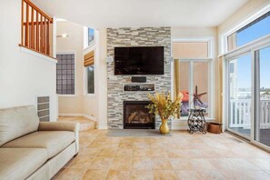 TV, fireplace, DVD player, offices - Bayfront Home with Stunning Water Views Free WiFi, Central AC & Washer/Dryer (Ocean City)