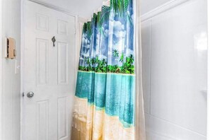 Shower, hair dryer, towels - Bright, sunny condo with ocean and bay views in walkable Midtown location (Ocean City)