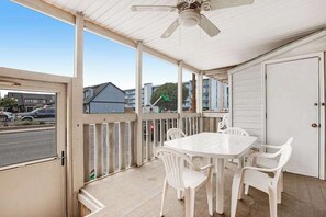 Outdoor dining - 2-story townhouse with deck, pool, AC, W/D & fireplace - walk to beach & dining (Ocean City)