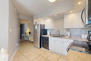 Fridge, microwave, oven, stovetop - Renovated Beachfront Penthouse: Steps to Boardwalk, Dining, Entertainment (Ocean City)