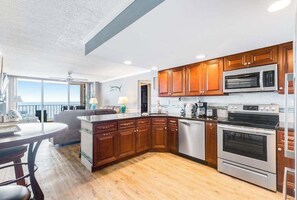 Fridge, microwave, oven, stovetop - Ideal Ocean City escape with beach access, ocean views, balcony & pool access (Ocean City)