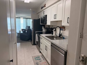 Fridge, microwave, oven, stovetop - Oceanfront Condo with Direct Beach View, Balcony, AC, WiFi & Laundry (Ocean City)