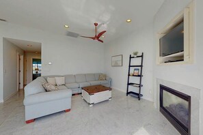 TV, fireplace, DVD player, offices - Light-Filled Waterfront Condo w/ Marsh & Bay Views, Deck, Shared Pool & Tennis (Ocean City)