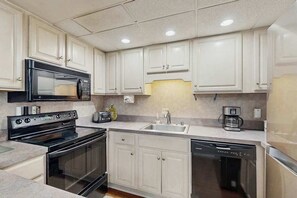 Fridge, microwave, oven, stovetop - Waterfront condo with incredible views, balcony, washer/dryer, pools & sauna (Ocean City)