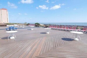 Outdoor dining - Bright Condo w/Private Balcony, Beach Views, Shared Pools, Gym, A/C, Free WiFi (Ocean City)