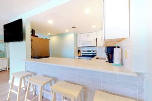 Fridge, microwave, oven, stovetop - Updated, third-floor condo with balcony, W/D, central AC, & WiFi - near beach (Ocean City)