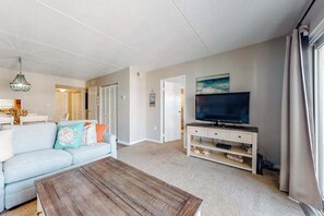 TV, offices - Dreamy coastal condo on the canal with sunset views, private balcony & free WiFi (Ocean City)