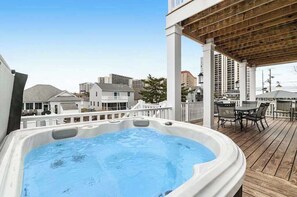 Outdoor dining - Canal-front getaway with private hot tub, large deck & firepit - dog-friendly (Ocean City)
