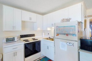 Fridge, microwave, oven, stovetop - Simple, Oceanfront Condo with Central AC, Free WiFi & Easy Beach Access (Ocean City)