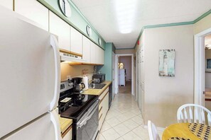 Fridge, microwave, oven, stovetop - Oceanfront Condo with Balcony Overlooking the Beach, AC, WiFi & Laundry (Ocean City)