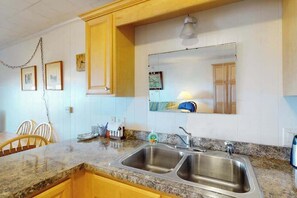 Fridge, microwave, oven, stovetop - Oceanfront escape close to boardwalk with balcony, W/D, and direct beach access (Ocean City)