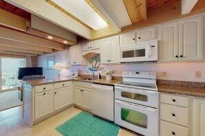 Fridge, microwave, oven, stovetop - 4-Story beachfront townhome with ocean views, balconies, deck, outdoor shower (Ocean City)