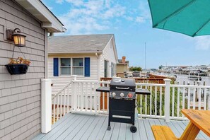 Outdoor dining - Dog-friendly, canal-front home with community pool & tennis, dock, & WiFi (Ocean City)