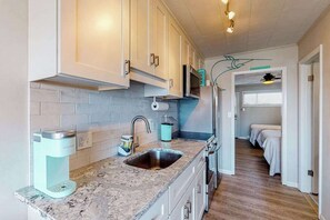 Fridge, microwave, oven, stovetop - Renovated bayfront condo with water-view balcony & fast WiFi - walk to beach (Ocean City)