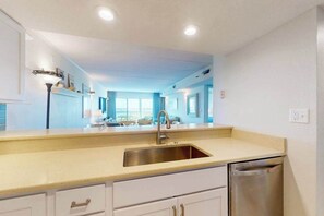 Fridge, microwave, oven, stovetop - Top floor Bay-view condo blocks from the beach with pool, balcony, WiFi & W/D (Ocean City)