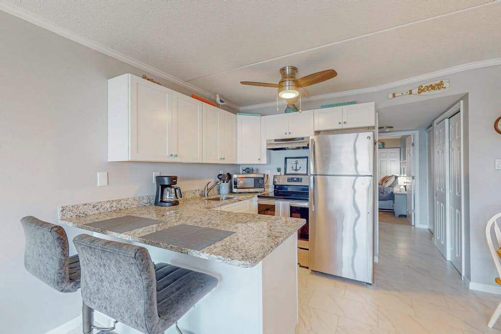 Coffee/tea maker, fridge, microwave, oven