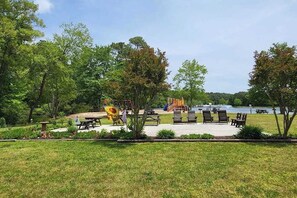 Children’s area - Sunny coastal home with private patio, on-site pool, central AC, & W/D (Berlin)