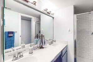 Shower, towels - Oceanfront condo with a furnished balcony, central AC, washer/dryer, & pool (Ocean City)