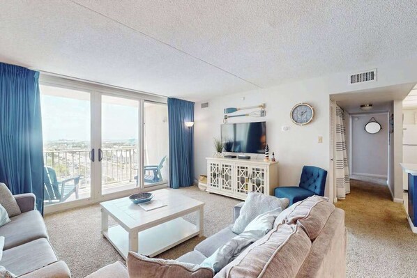 TV, offices - Beachfront condo with ocean and bay views, fast WiFi, pools, & game room (Ocean City)