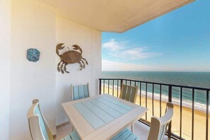 Outdoor dining - Luxury beachfront condo w/shared indoor & outdoor pools, free WiFi & ocean views (Ocean City)