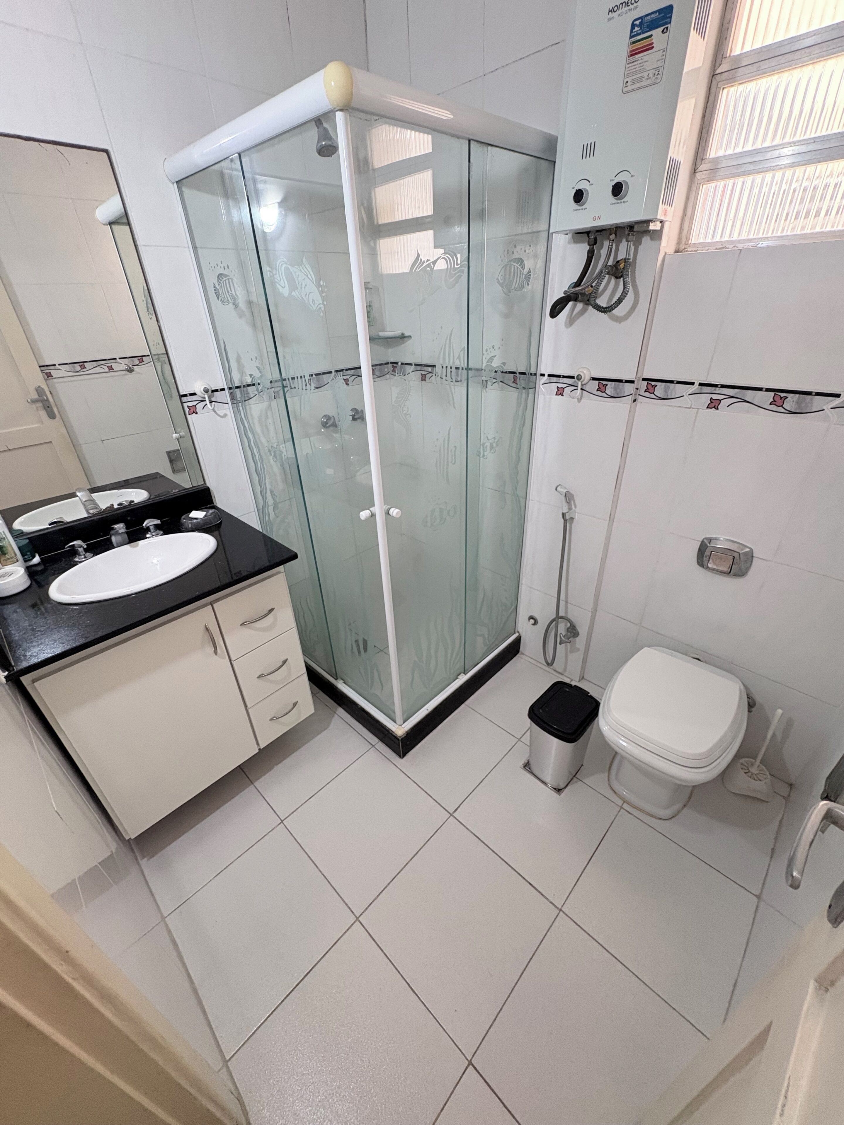 Shower, towels, soap, toilet paper
