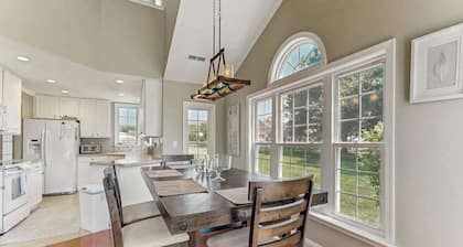 Coastal resort with pool, golf, fireplace, W/D, sunroom & beach access