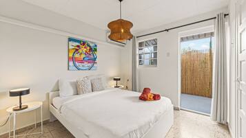 Apartment, Patio, Pool View | In-room safe, blackout curtains, iron/ironing board, free WiFi