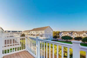 Property grounds - Dog-friendly, water-view townhome with shared pool, patio, grill (West Ocean City)