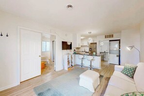 TV, offices - Canal-side condo near beach with water view, pool, private deck, & courtyard (Ocean City)
