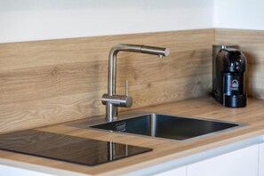 Apartment | Private kitchen - ISULA TRAVEL - Panoramic Relax Lodges (Noto)