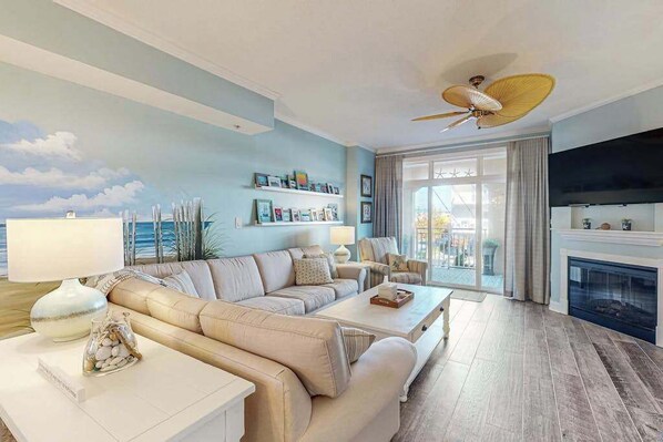 TV, fireplace, offices - Sunny - Ocean Block Condo, steps to the beach with pool, balcony & fitness room (Ocean City)